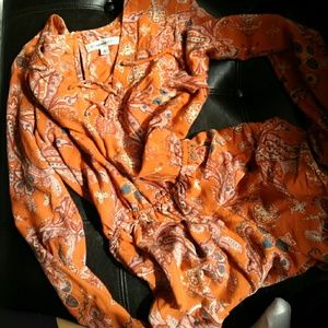 Orange long sleeve romper